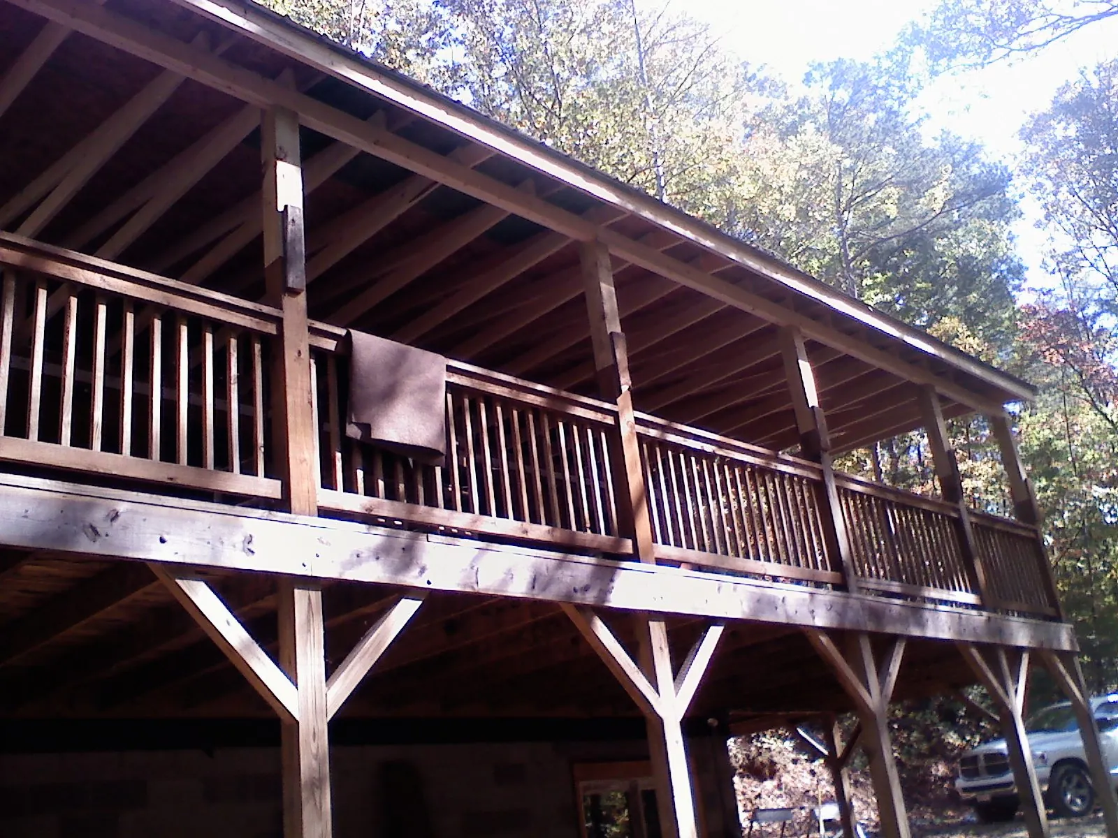 Timber framing under a new elevated porch and deck — Roof Leak Repair in New Knoxville by Roofing Brothers